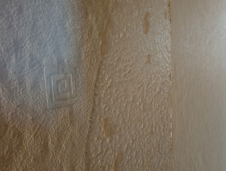 wallpaper-over-woodchip